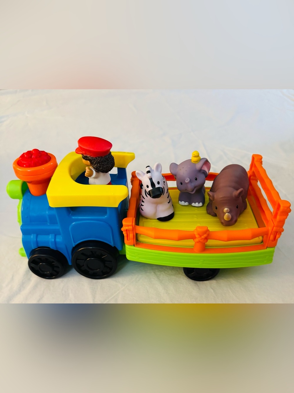 Little People Blue and Yellow Zoo Animal Toy Train with Zebra, Elephant, and Hip